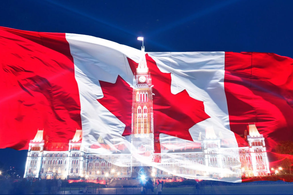 Canadian flag over parliament
