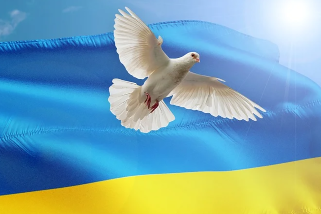Dove flying in front of the Ukraine flag (blue and yellow stripes)