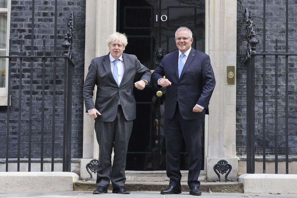 PM Boris Johnson and Scott Morrison in front of Number 10 bumping elbows