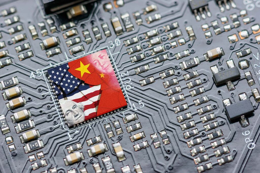 Microchip with half of the US and China flags next to each other in the middle of the microchip